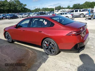 2024 BMW i5 eDrive40 with VIN WBY33FK01RCR76500, listed as a Copart auction lot 65026585 with 3,601 mi miles and Salvage title. Bid and sale history available at DreamBid. Image 2.