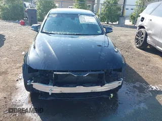 2013 BMW 3 Series 328i xDrive z VIN WBA3B5G57DNS05892, wystawiony jako IAAI lot #42560892 z przebiegiem 141 676 mil mil oraz . Historia ofert i sprzedaży dostępna na DreamBid. Obrazek 13.