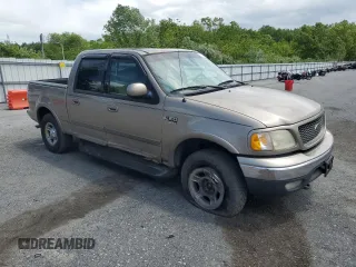 2001 Ford F-150 XLT z VIN 1FTRW08L71KB33686, wystawiony jako Copart lot #58133455 z przebiegiem 248 370 mil mil oraz Szkoda całkowita • Salvage title. Historia ofert i sprzedaży dostępna na DreamBid. Obrazek 4.