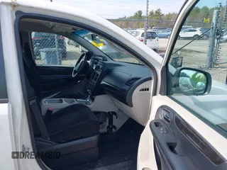 2012 Dodge Grand Caravan SXT with VIN 2C4RDGCGXCR358794, listed as a IAAI auction lot 42007316 with 212,518 mi miles and . Bid and sale history available at DreamBid. Image 5.