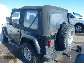 1999 Jeep Wrangler Sport with VIN 1J4FY19SXXP456810, listed as a IAAI auction lot 41725834 with 93,151 mi miles. Bid and sale history available at carsss.com. Image 3.