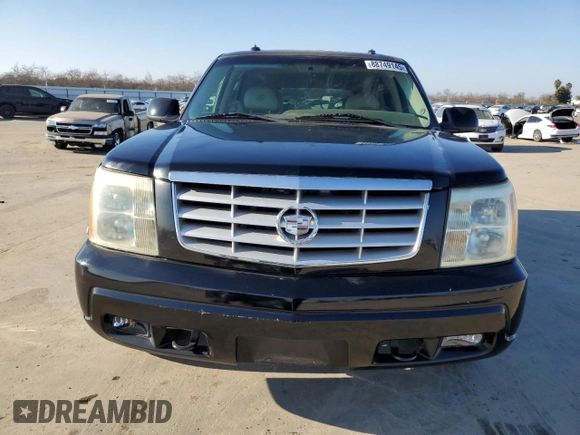 2003 Cadillac Escalade with VIN 1GYEC63T43R157689, listed as a Copart auction lot 88749145 with 138,905 mi miles and Salvage title. Bid and sale history available at DreamBid. Image 5.