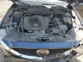 2018 Mazda CX-5 Grand Touring with VIN JM3KFBDM8J0342272, listed as a Copart auction lot 61930115 with 119,727 mi miles and Salvage title. Bid and sale history available at DreamBid. Image 12.