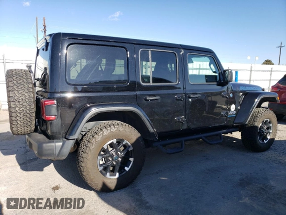 2024 Jeep Wrangler Rubicon with VIN 1C4RJXR69RW132849, listed as a Copart auction lot 48237325 with 18,725 mi miles and Salvage Title. Bid and sale history available at DreamBid. Image 3.
