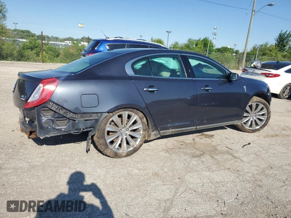 2014 Lincoln MKS EcoBoost z VIN 1LNHL9FT8EG607807, wystawiony jako Copart lot #57755915 z przebiegiem 203 316 mil mil oraz Szkoda całkowita • Salvage title. Historia ofert i sprzedaży dostępna na DreamBid. Obrazek 3.