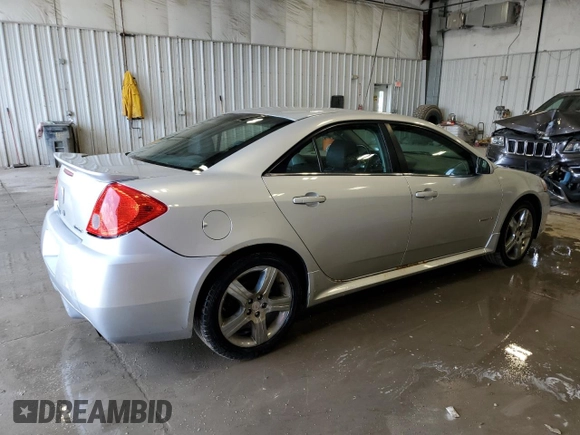 2009 Pontiac G6 with VIN 1G2ZL577894230250, listed as a Copart auction lot 63275235 with 166,792 mi miles and Clean title. Bid and sale history available at DreamBid. Image 3.
