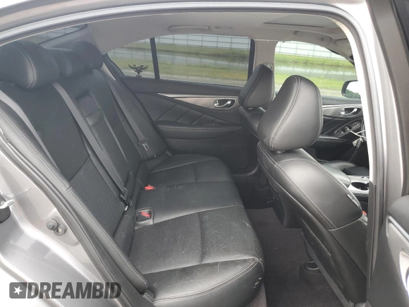 2015 Infiniti Q50 Premium z VIN JN1BV7AR3FM392685, wystawiony jako Copart lot #63233075 z przebiegiem 71 164 mil mil oraz Szkoda całkowita • Salvage title. Historia ofert i sprzedaży dostępna na DreamBid. Obrazek 10.