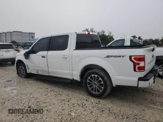 2018 Ford F-150 XL with VIN 1FTEW1CP6JKD50225, listed as a Copart auction lot 59179605 with 105,602 mi miles and Salvage title. Bid and sale history available at DreamBid. Image 2.