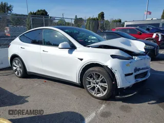 2022 Tesla Model Y Long Range z VIN 7SAYGDEE8NF374636, wystawiony jako IAAI lot #41545669 z przebiegiem 41 965 mil mil oraz . Historia ofert i sprzedaży dostępna na DreamBid. Obrazek 13.