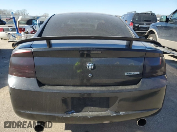 2006 Dodge Charger SRT-8 with VIN 2B3KA73W76H421802, listed as a Copart auction lot 83709404 with Not Provided miles and Salvage Title. Bid and sale history available at DreamBid. Image 6.