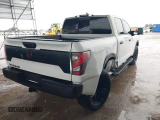 2024 Nissan Titan Pro-4X with VIN 1N6AA1EDXRN105077, listed as a IAAI auction lot 41545734 with 8,505 mi miles and . Bid and sale history available at DreamBid. Image 4.