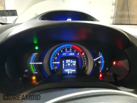 2010 Honda Insight EX with VIN JHMZE2H76AS021610, listed as a Copart auction lot 62992225 with 162,974 mi miles and Salvage title. Bid and sale history available at DreamBid. Image 9.