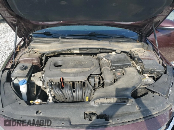 2016 Kia Optima LX z VIN 5XXGT4L3XGG024883, wystawiony jako Copart lot #57380685 z przebiegiem 135 233 mil mil oraz Szkoda całkowita • Salvage title. Historia ofert i sprzedaży dostępna na DreamBid. Obrazek 11.