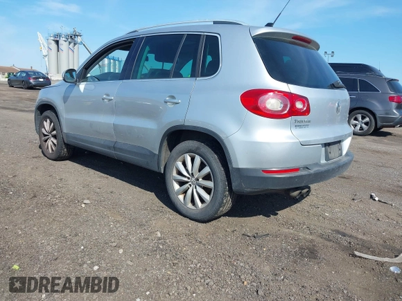 2011 Volkswagen Tiguan SE with VIN WVGBV7AX4BW528845, listed as a IAAI auction lot 42248245 with 224,808 mi miles and . Bid and sale history available at DreamBid. Image 3.