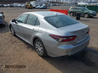 2022 Toyota Camry Hybrid LE with VIN 4T1C31AK9NU595842, listed as a IAAI auction lot 41764564 with 33,783 mi miles. Bid and sale history available at carsss.com. Image 3.