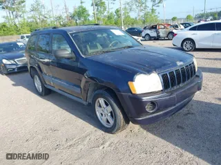 2005 Jeep Grand Cherokee Laredo with VIN 1J4GS48K35C541887, listed as a IAAI auction lot 41956175 with 1 mi miles. Bid and sale history available at carsss.com. Image 1.