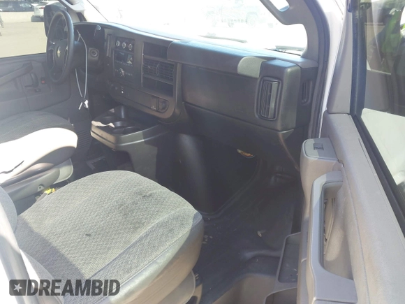 2016 Chevrolet Express Cargo Van with VIN 1GCWGAFF0G1323959, listed as a IAAI auction lot 42172260 with 211,384 mi miles. Bid and sale history available at carsss.com. Image 5.