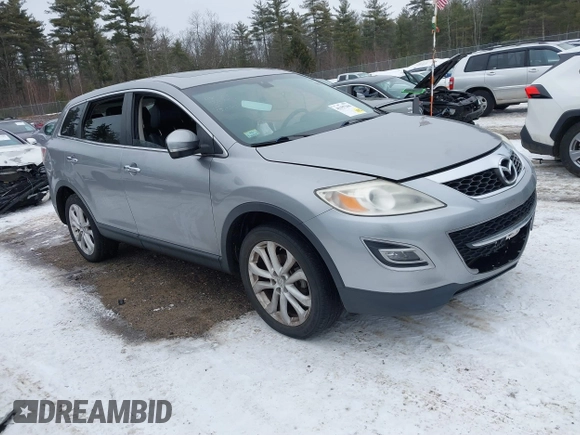 2012 Mazda CX-9 Grand Touring with VIN JM3TB3DV2C0353558, listed as a IAAI auction lot 41397266 with 158,843 mi miles and . Bid and sale history available at DreamBid. Image 1.