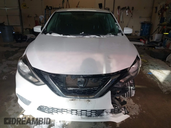2019 Nissan Sentra S z VIN 3N1AB7AP9KY325065, wystawiony jako IAAI lot #41612204 z przebiegiem 141 818 mil mil oraz . Historia ofert i sprzedaży dostępna na DreamBid. Obrazek 6.