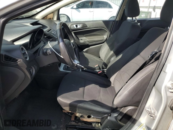 2016 Ford Fiesta SE z VIN 3FADP4BJ3GM142298, wystawiony jako Copart lot #54320835 z przebiegiem 144 636 mil mil oraz Szkoda całkowita • Salvage title. Historia ofert i sprzedaży dostępna na DreamBid. Obrazek 7.