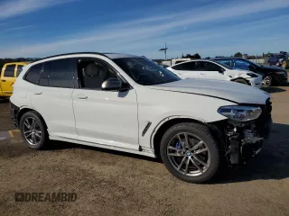 2020 BMW X3 M40i with VIN 5UXTY9C09L9B31399, listed as a Copart auction lot 87004624 with Not Provided miles and Salvage Title. Bid and sale history available at DreamBid. Image 4.