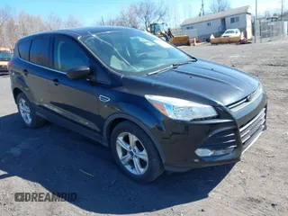 2015 Ford Escape SE with VIN 1FMCU9GX2FUB68101, listed as a IAAI auction lot 41902379 with 136,248 mi miles. Bid and sale history available at carsss.com. Image 1.