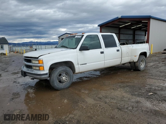 1999 Chevrolet Silverado 3500 z VIN 1GCHC33J2XF087634, wystawiony jako Copart lot #58106714 z przebiegiem 205 431 mil mil oraz Czysty tytuł • Clean title. Historia ofert i sprzedaży dostępna na DreamBid. Obrazek 1.