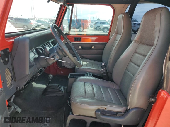 1992 Jeep Wrangler with VIN 2J4FY29S3NJ535736, listed as a Copart auction lot 67747244 with 144,912 mi miles and Salvage Title. Bid and sale history available at carsss.com. Image 7.