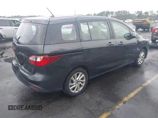 2015 Mazda 5 Sport with VIN JM1CW2BL3F0188052, listed as a IAAI auction lot 40777036 with 69,405 mi miles. Bid and sale history available at carsss.com. Image 4.