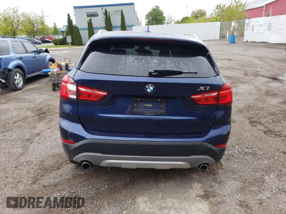 2018 BMW X1 xDrive28i with VIN WBXHT3C35J5F88893, listed as a Copart auction lot 58032725 with 143,968 mi miles and Salvage title. Bid and sale history available at DreamBid. Image 6.