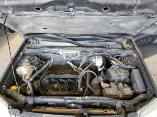 2009 Mercury Mariner with VIN 4M2CU91779KJ12744, listed as a Copart auction lot 73102964 with 164,117 mi miles and Salvage Title. Bid and sale history available at carsss.com. Image 12.