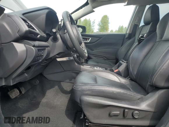 2021 Subaru Forester Touring z VIN JF2SKAXC0MH560263, wystawiony jako Copart lot #61453195 z przebiegiem Nie podano mil oraz Szkoda całkowita • Salvage title. Historia ofert i sprzedaży dostępna na DreamBid. Obrazek 7.