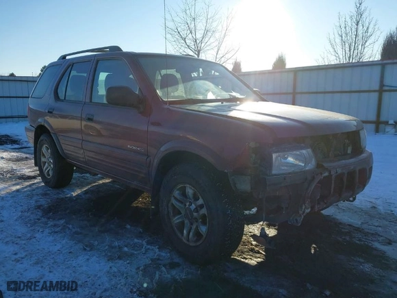 2002 Isuzu Rodeo with VIN 4S2DM58W124319936, listed as a IAAI auction lot 41555285 with 143,035 mi miles. Bid and sale history available at carsss.com. Image 1.