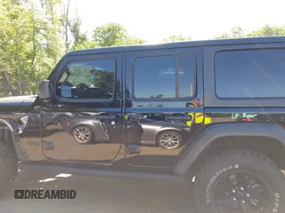 2021 Jeep Wrangler Unlimited Sport S with VIN 1C4HJXDNXMW646194, listed as a IAAI auction lot 42243169 with 44,237 mi miles and . Bid and sale history available at DreamBid. Image 14.