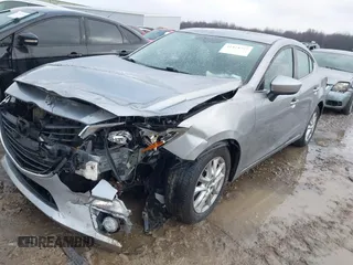 2015 Mazda 3 i Grand Touring with VIN JM1BM1W79F1256535, listed as a IAAI auction lot 41474347 with 128,573 mi miles and . Bid and sale history available at DreamBid. Image 2.