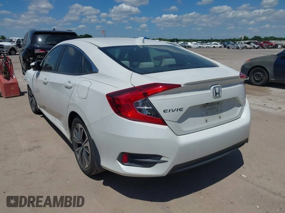 2018 Honda Civic EX-T z VIN JHMFC1F3XJX001723, wystawiony jako IAAI lot #42228776 z przebiegiem 97 432 mil mil oraz . Historia ofert i sprzedaży dostępna na DreamBid. Obrazek 3.