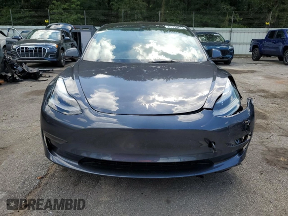 2023 Tesla Model 3 с VIN 5YJ3E1EA0PF617724, выставлен на аукционе Copart как лот 64719645 с пробегом Не указан миль и Списание • Salvage title. История ставок и продаж доступна на DreamBid. Изображение 5.