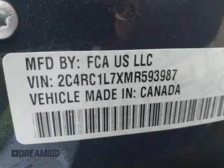 2021 Chrysler Pacifica Hybrid Touring L z VIN 2C4RC1L7XMR593987, wystawiony jako IAAI lot #41855966 z przebiegiem 72 685 mil mil oraz . Historia ofert i sprzedaży dostępna na DreamBid. Obrazek 9.