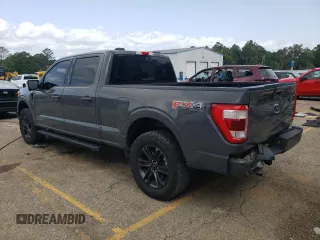 2021 Ford F-150 XL with VIN 1FTFW1ED0MFC98028, listed as a Copart auction lot 56652825 with 100,062 mi miles and Salvage title. Bid and sale history available at DreamBid. Image 2.