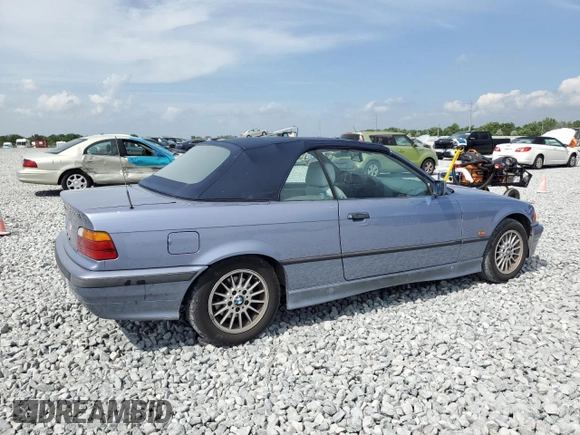 1997 BMW 3-Series 328IC with VIN WBABK832XVET96413, listed as a Copart auction lot 47806025 with 66,051 mi miles and Salvage Title. Bid and sale history available at carsss.com. Image 3.
