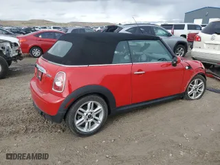 2012 MINI Cooper Convertible with VIN WMWZN3C56CT135341, listed as a Copart auction lot 48611575 with 0 mi miles and Salvage Title. Bid and sale history available at carsss.com. Image 3.