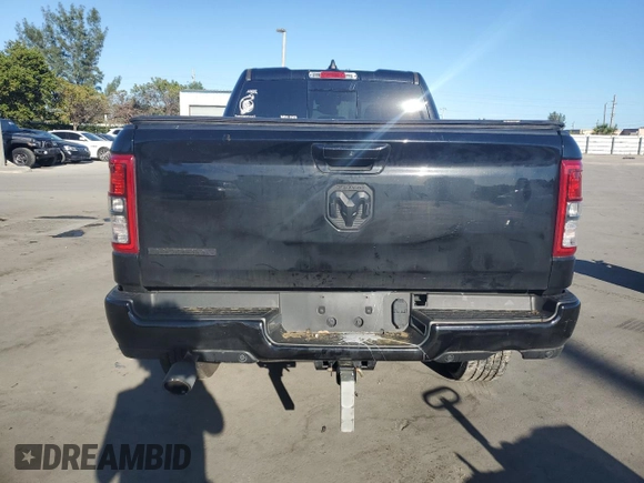 2023 Ram 1500 Lone Star with VIN 1C6RREBTXPN553048, listed as a Copart auction lot 46255525 with 59,497 mi miles and Salvage Title. Bid and sale history available at carsss.com. Image 6.