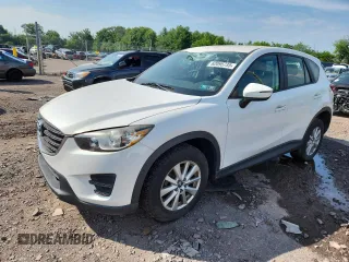 2016 Mazda CX-5 Sport with VIN JM3KE4BYXG0704194, listed as a Copart auction lot 62095735 with 93,970 mi miles and Salvage title. Bid and sale history available at DreamBid. Image 1.