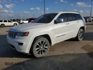 2018 Jeep Grand Cherokee Overland z VIN 1C4RJFCT9JC454714, wystawiony jako Copart lot #78268704 z przebiegiem 94 941 mil mil oraz Szkoda całkowita • Salvage title. Historia ofert i sprzedaży dostępna na DreamBid. Obrazek 1.