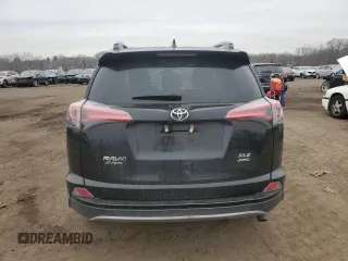 2018 Toyota RAV4 XLE with VIN 2T3RFREV0JW829291, listed as a Copart auction lot 47640525 with 115,633 mi miles and Salvage Title. Bid and sale history available at carsss.com. Image 6.