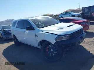 2021 Dodge Durango SRT Hellcat with VIN 1C4SDJH96MC692601, listed as a IAAI auction lot 41764490 with 27,434 mi miles and . Bid and sale history available at DreamBid. Image 1.