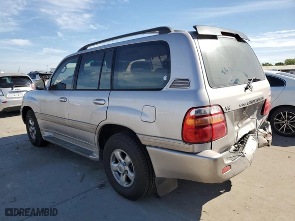 2002 Toyota Land Cruiser with VIN JTEHT05J922020391, listed as a Copart auction lot 52810615 with 309,358 mi miles and Salvage Title. Bid and sale history available at carsss.com. Image 2.