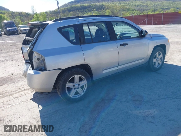 2008 Jeep Compass Sport with VIN 1J8FT47088D784150, listed as a IAAI auction lot 42122964 with 241,302 mi miles. Bid and sale history available at carsss.com. Image 4.