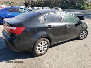 2014 Kia Rio LX with VIN KNADM4A35E6407058, listed as a Copart auction lot 72997044 with 76,215 mi miles and Salvage Title. Bid and sale history available at DreamBid. Image 3.