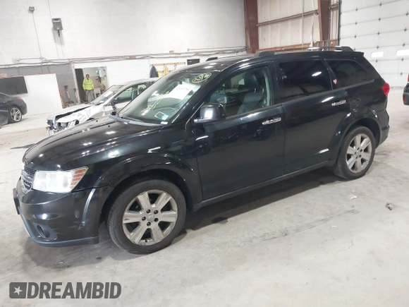 2012 Dodge Journey Crew with VIN 3C4PDCDG4CT231762, listed as a IAAI auction lot 42049784 with 158,195 mi miles and . Bid and sale history available at DreamBid. Image 2.
